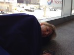 Connie catching some much needed shut-eye in the terminal at Abu Dhabi, United Arab Emirates.