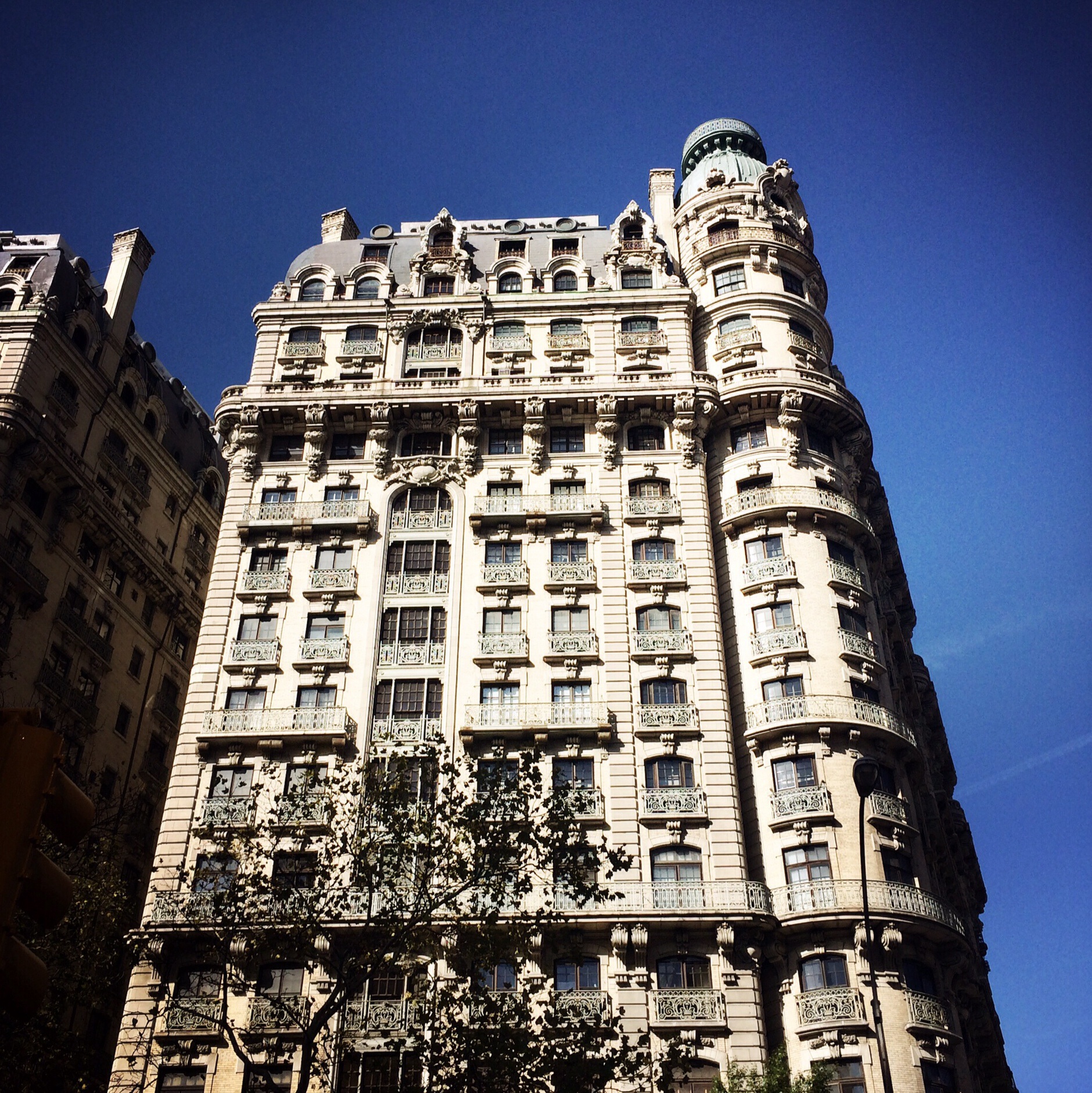 Beaux-Arts. This is a huge apartment block and hotel. I think it looks like a French visitor.