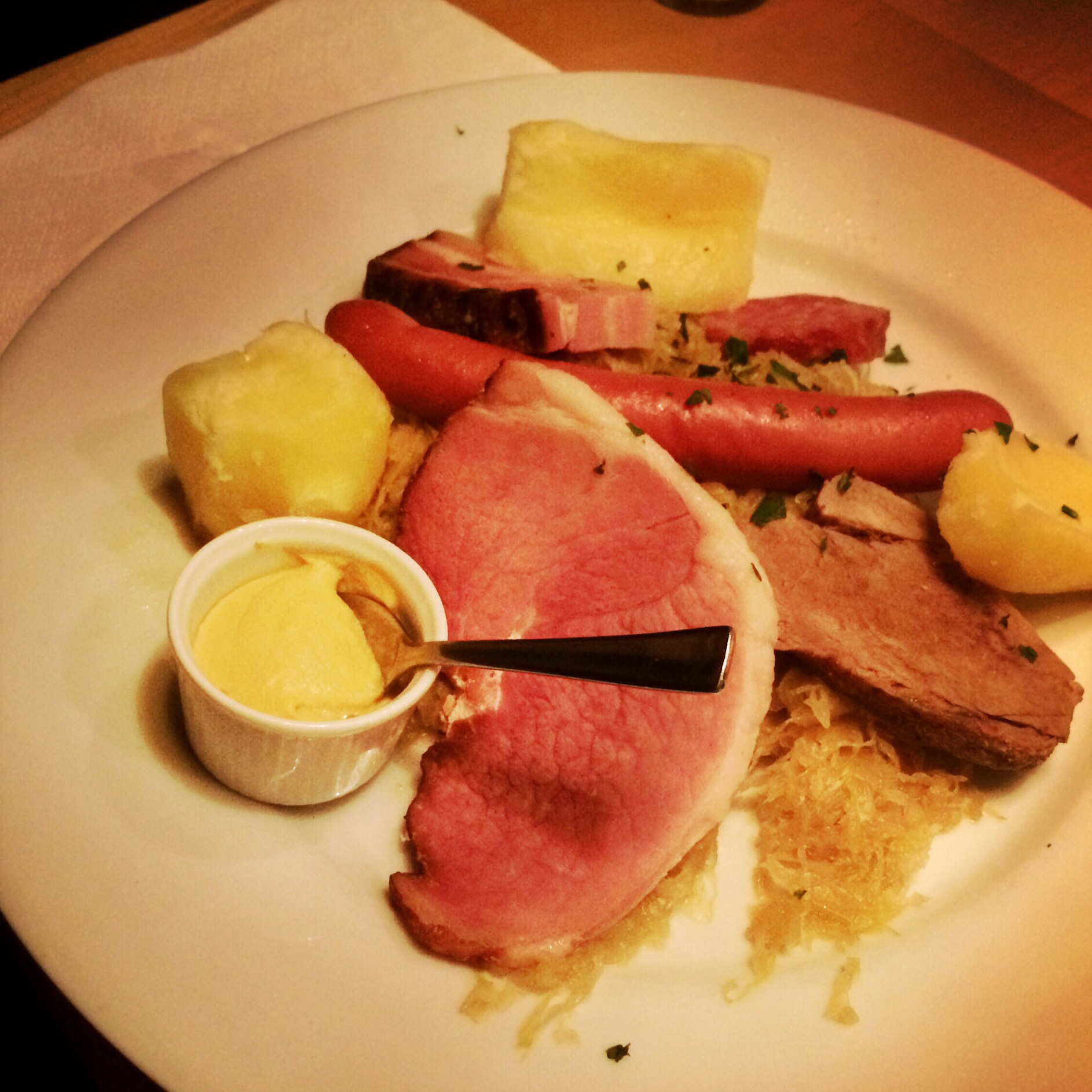 Berner plate: Sausages and various meats, boiled potato on a bed of sauerkraut. Not for vegetarians.