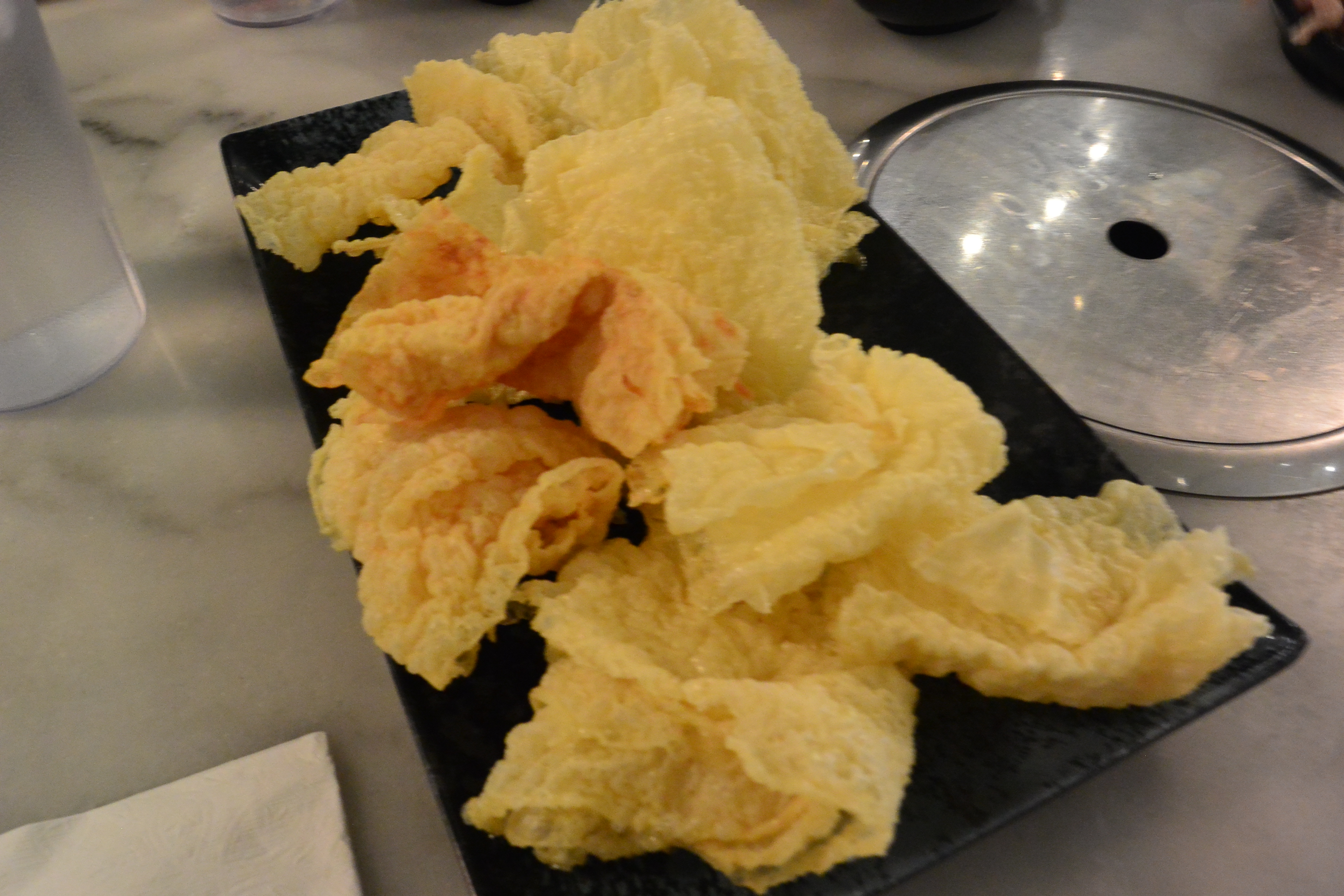 Deep-fried bean curd. Great for holding flavour.