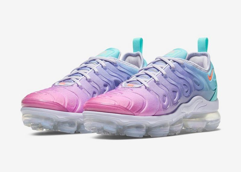 Zapatilla Nike Revolution Rosa/Celeste Mujer
