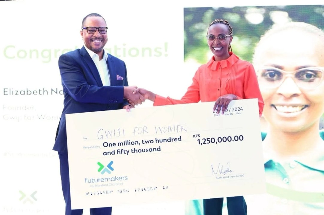 Peter Gitau, Chief Technology and Operations Officer - Standard Chartered Kenya and East Africa together with Elizabeth Nduta founder of Gwiji for Women, one of the top 7 winners of the Standard Chartered Women in Tech Cohort 7 program
