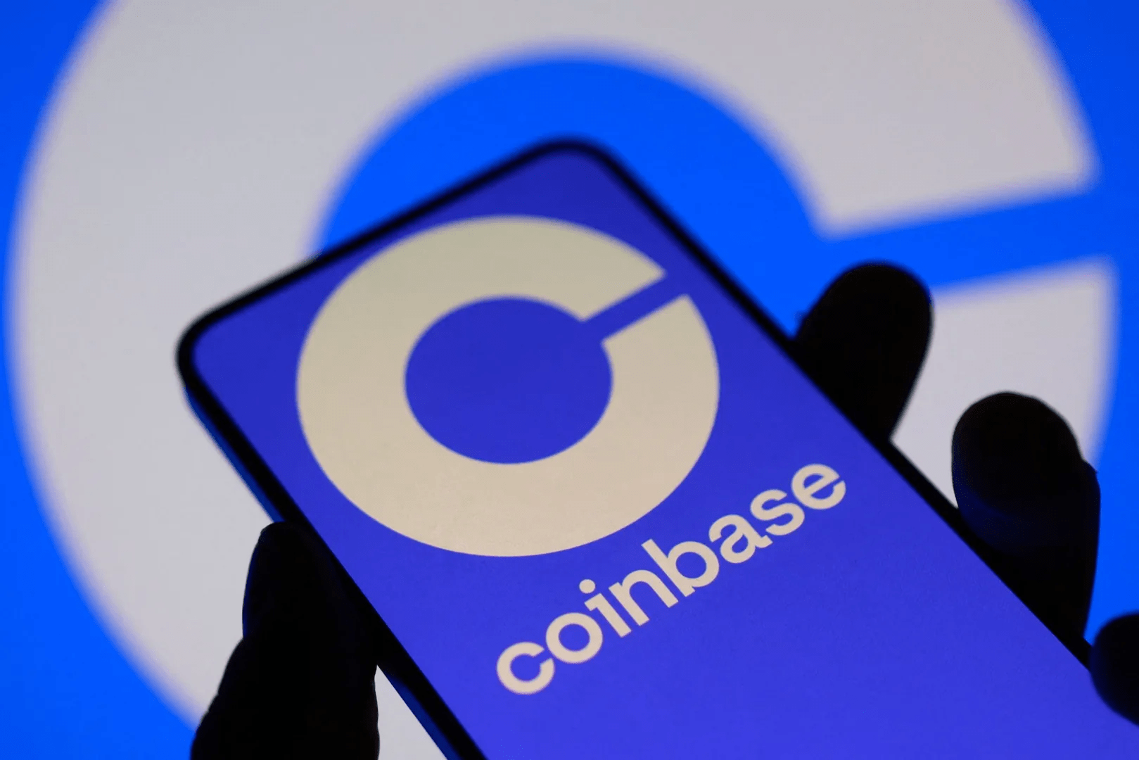 Coinbase logs second straight quarterly loss as crypto trading momentum fades