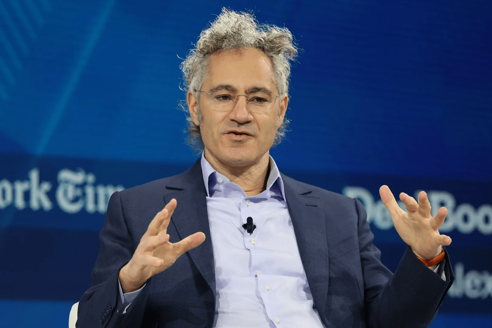 Palantir CEO Alex Karp says executives who brag about their AI cuts might as well ‘sign up for the Bernie Sanders manifesto’
