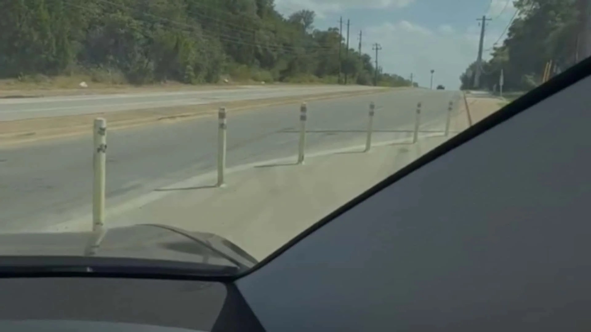 Watch: Tesla Robotaxi Pushes Through Austin Bollards