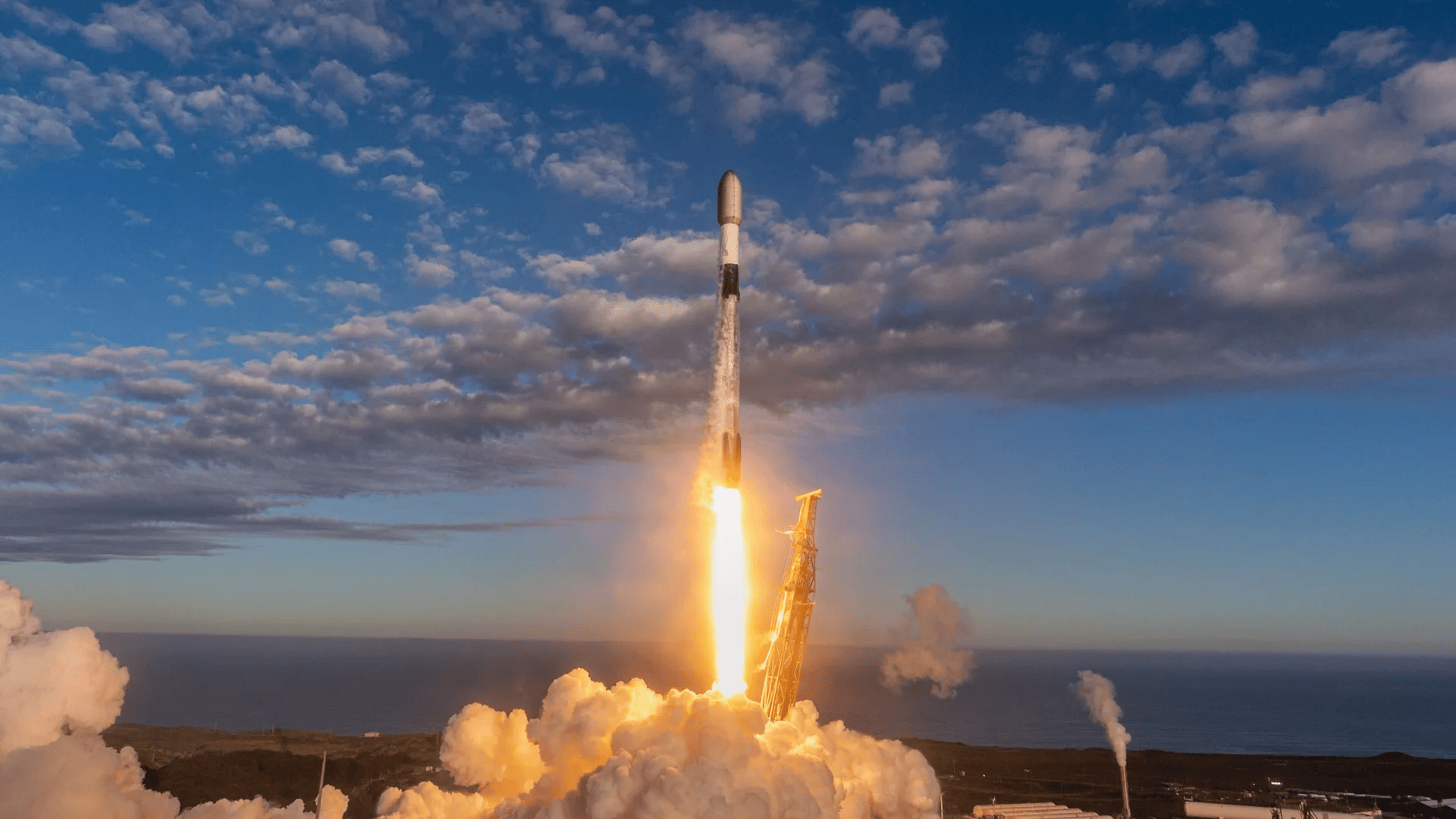 SpaceX Falcon 9 rocket launches 27 Starlink satellites, lands on ship at sea (video)