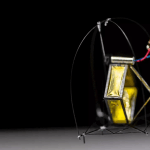Palm-sized robot makes controlled jumps using a tiny electric motor