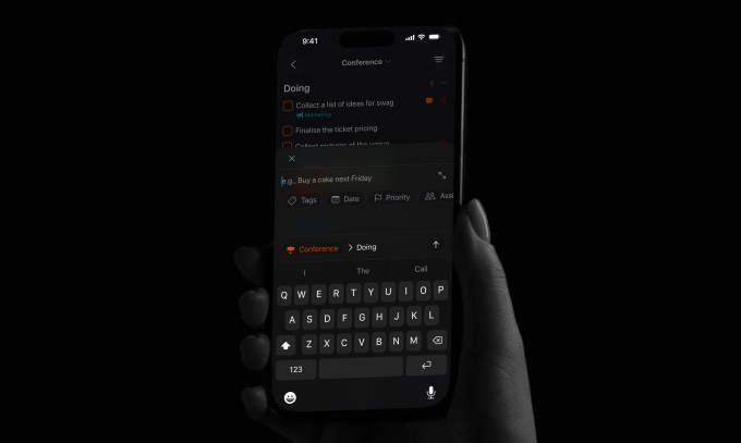 This is a lifestyle shot of Tasks app showing screen with a new feautre that uses local models to suggest tags when you enter a task.
