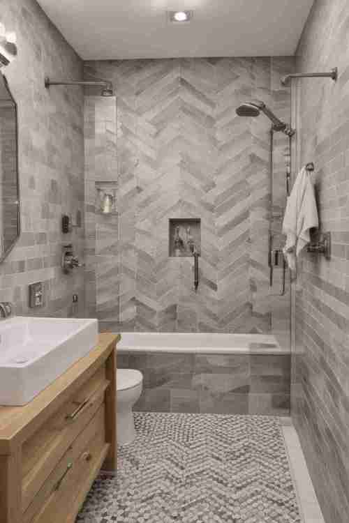 38 Trendy Shower Tile Ideas to Transform Small Bathrooms with Style 31 Chevron Patterned Tile 1