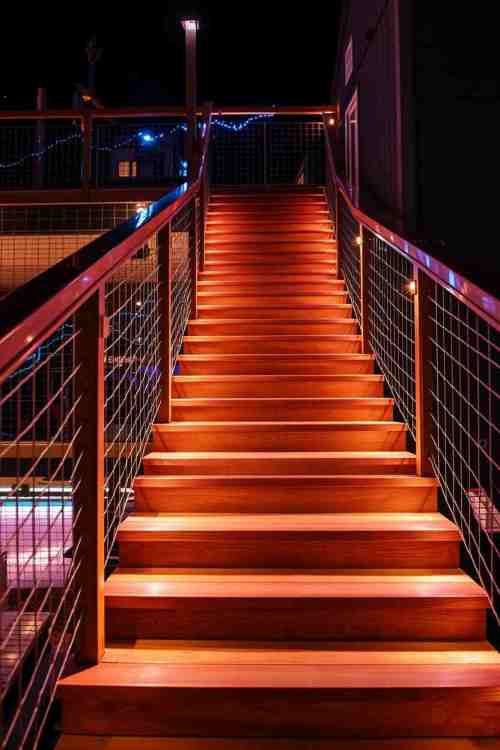 38 Unique Deck Stair Ideas to Elevate Your Outdoor Living Space 31 Cable Railing