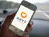 --FILE--A Chinese mobile phone user uses the taxi-hailing and car-service app Didi Chuxing on a smartphone in Ji'nan city, east China's Shandong province, 2 October 2016.

Chinese ride-sharing platform Didi Chuxing's Beijing branch has stopped service for cars registered elsewhere in the country, Beijing News reports. Didi said the adjustment began on Monday (20 March 2017), and targets all cars without Beijing license plates in order to conform to the city's new rule. "In accordance with the requirement of Beijing's transport authority, from March 20 we will gradually halt service for cars with non-Beijing license plates within Beijing's 3rd Ring Road," Didi said in a text message to some of its registered drivers. "In order to protect car owners' rights and interests, we advise that you return to the place where your car is registered to continue to receive orders, or you can participate in programs for the trading of second-hand cars, new car buying with discounts, or car rentals at preferential prices," it was added. In late December, Beijing required all drivers for car-hailing services to be permanent residents and their vehicles to be locally registered, a threshold that would disqualify many of the present pool of drivers. It gave a five-month transition period. In practice, Didi drivers who are not Beijing permanent residents have not been affected so far. Shanghai has issued a similar rule, and Didi moved to stop service for unqualified cars in January.