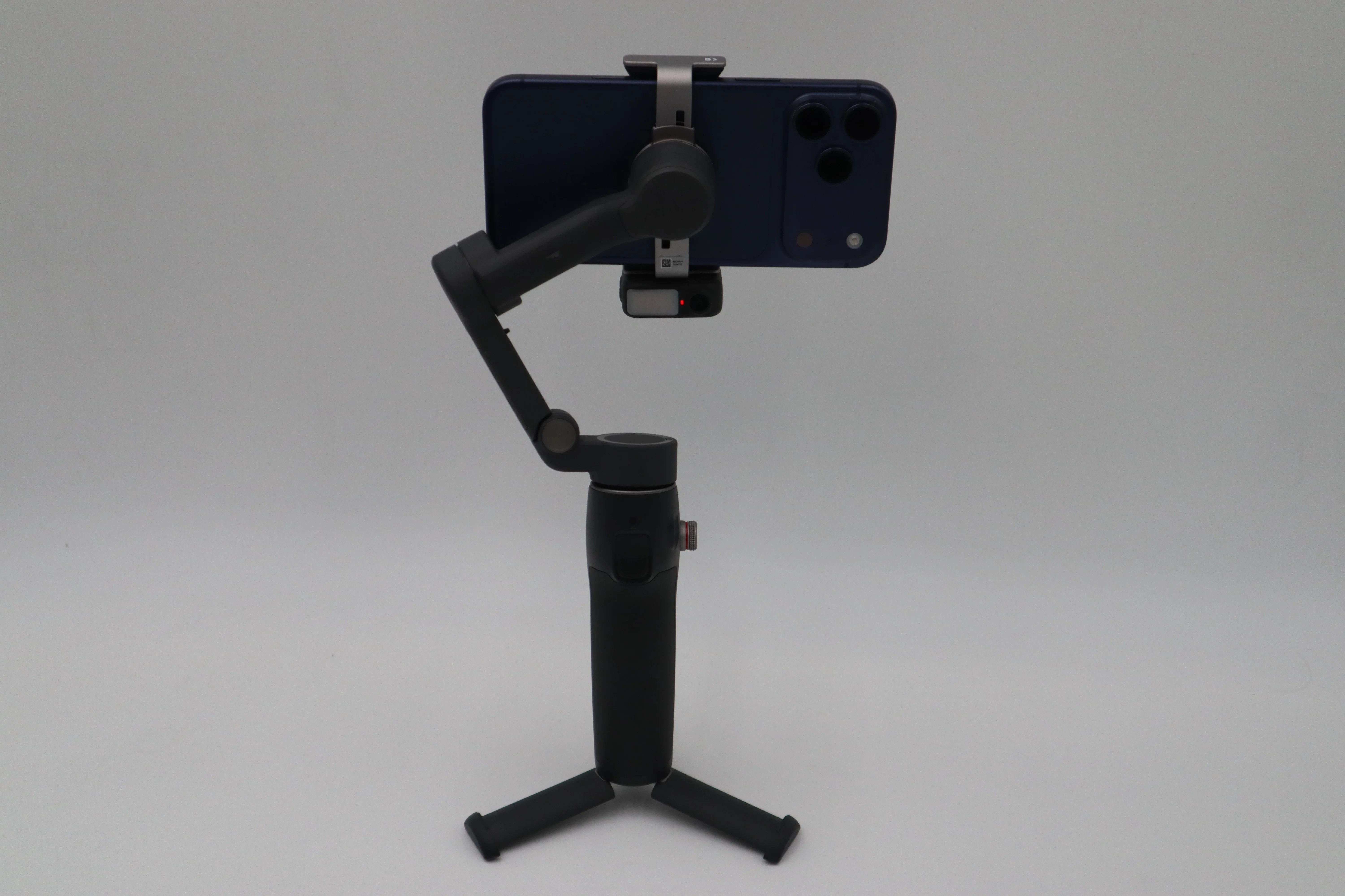DJI Osmo Mobile 8 smartphone gimbal with phone mounted 