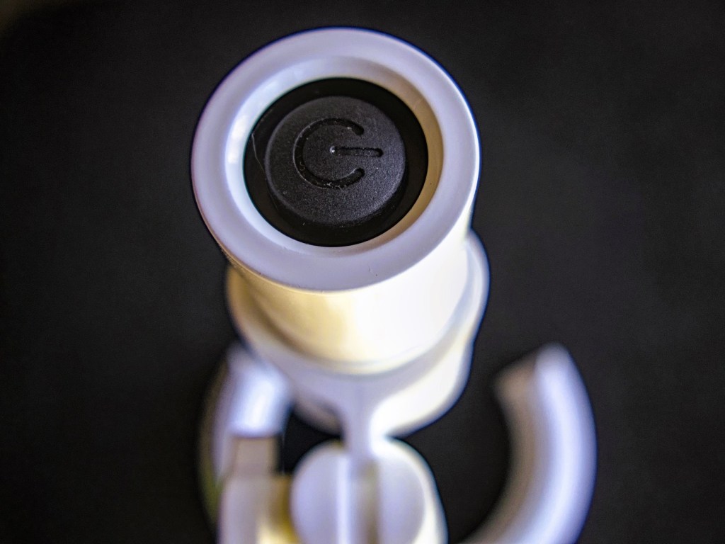 PuttAIM+ laser on button up close -- Techigar
