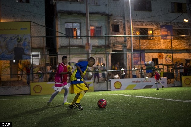 1410435827622_wps_6_children_play_soccer