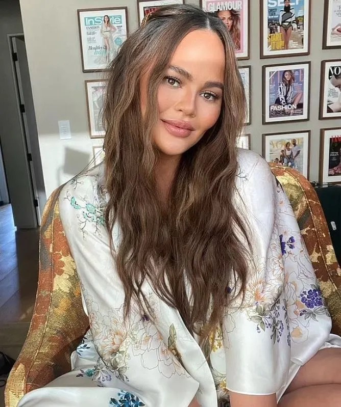 Pregnant Chrissy Teigen, 36, claims she has been hacking up blood… following gastric issues.