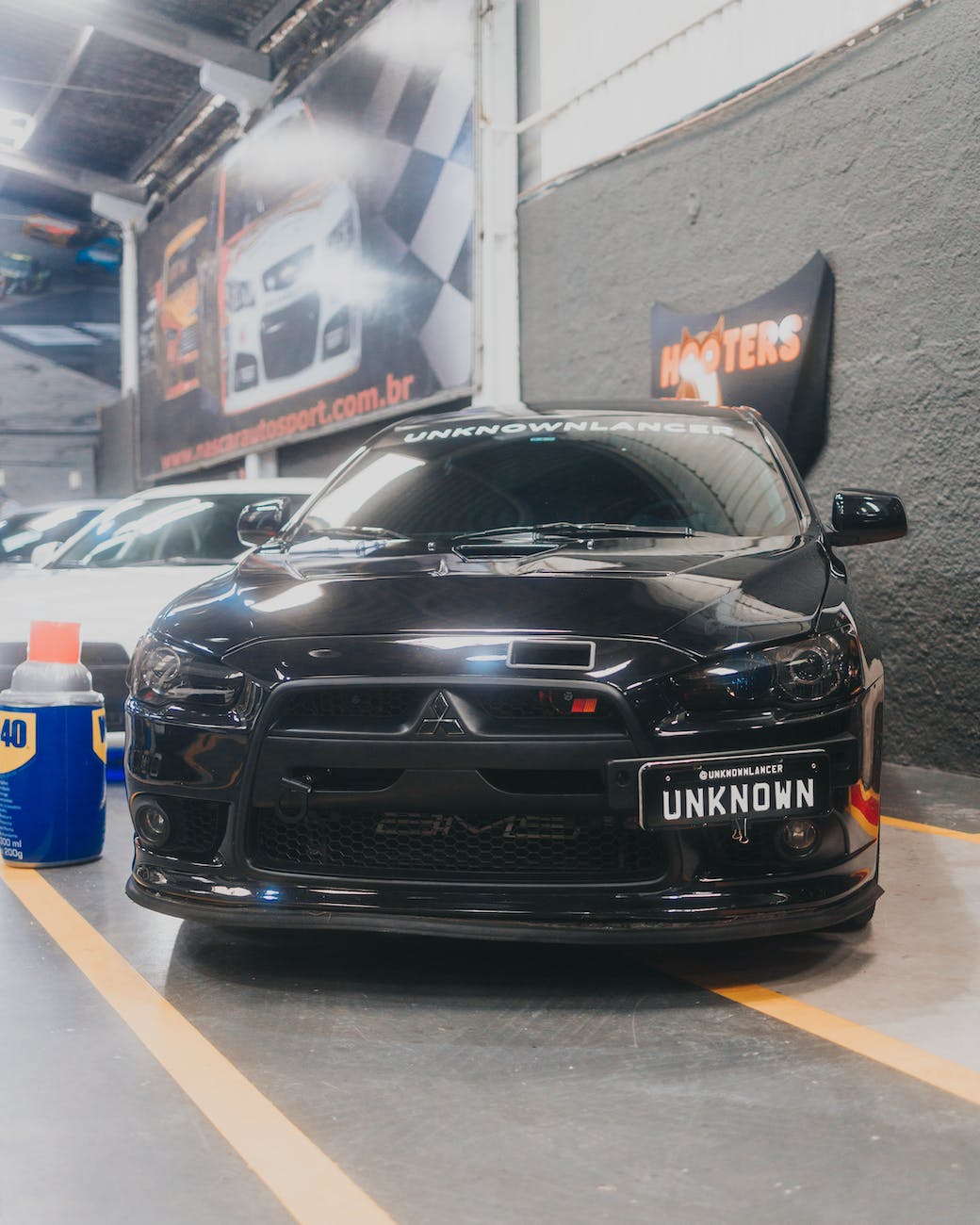 mitsubishi lancer evolution in a car dealership