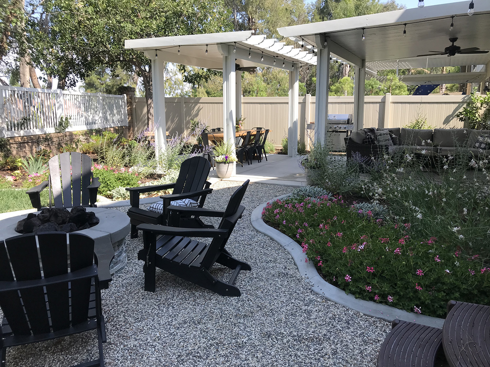 Shot of patio cover hung with string lights shading outdoor space.