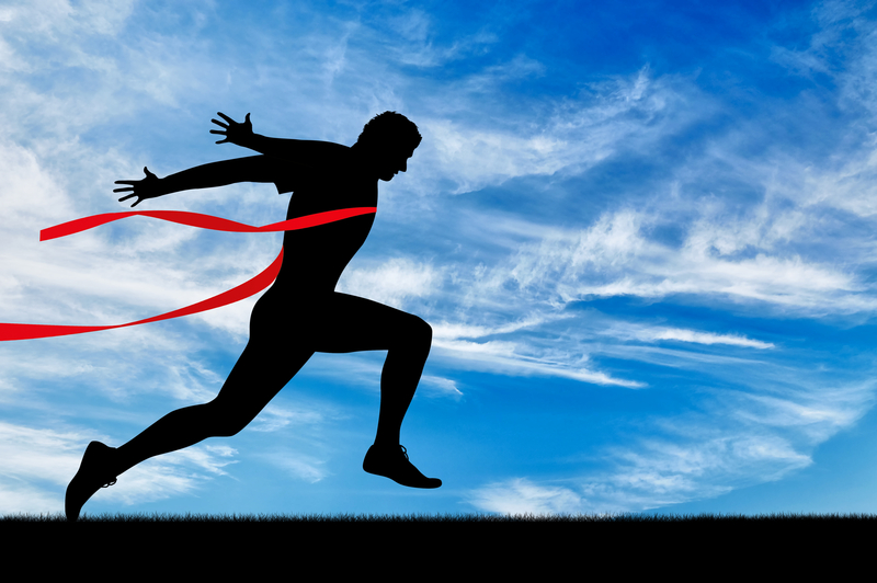 Running sports. Man runner and red tape