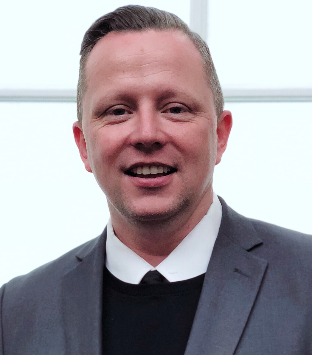 Headshot of Jon Tyson