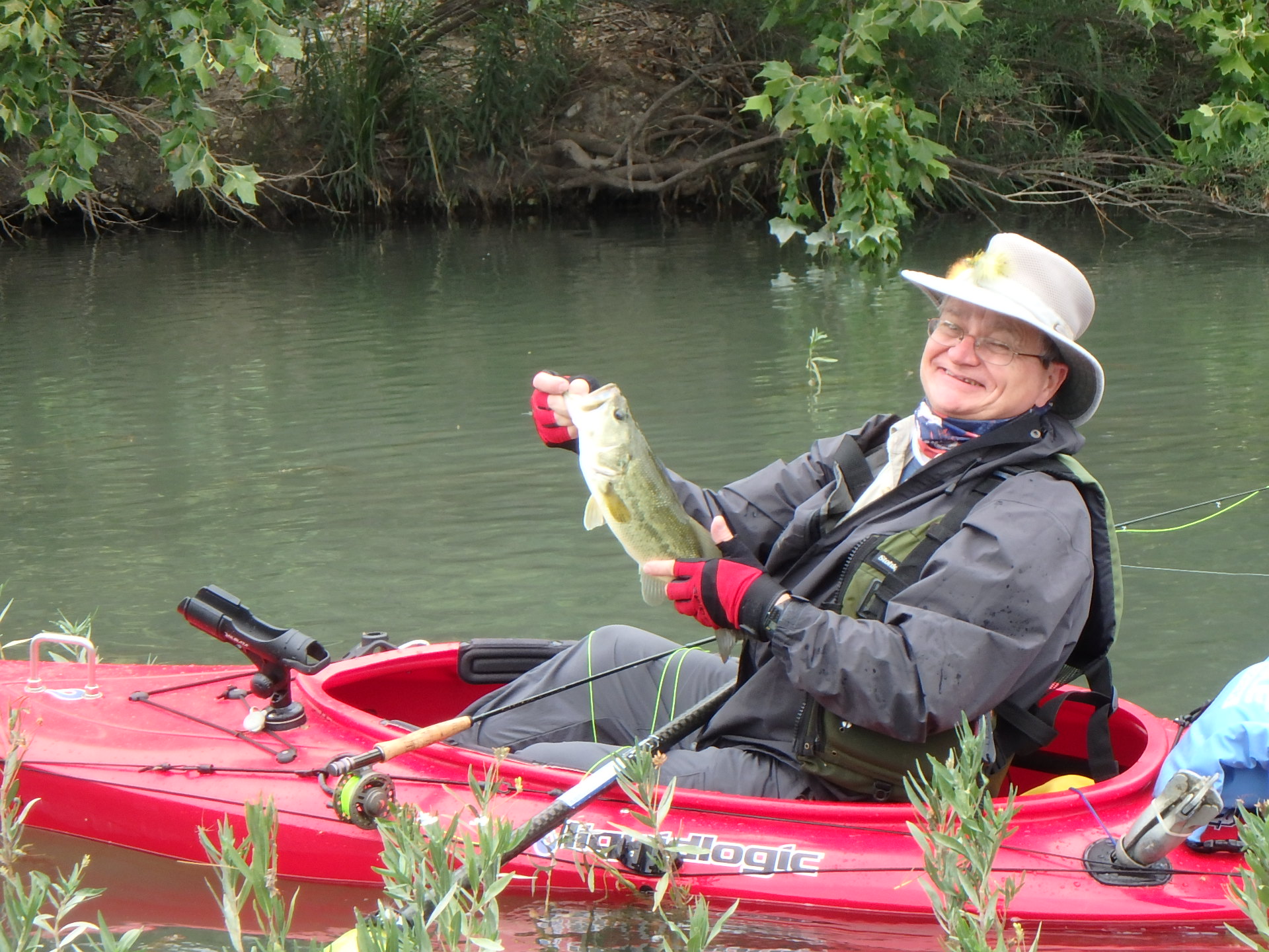 Larry lands a nice LMB on a topwater