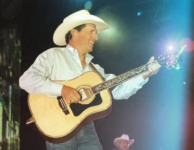 George Strait Singer George Strait playing guitar