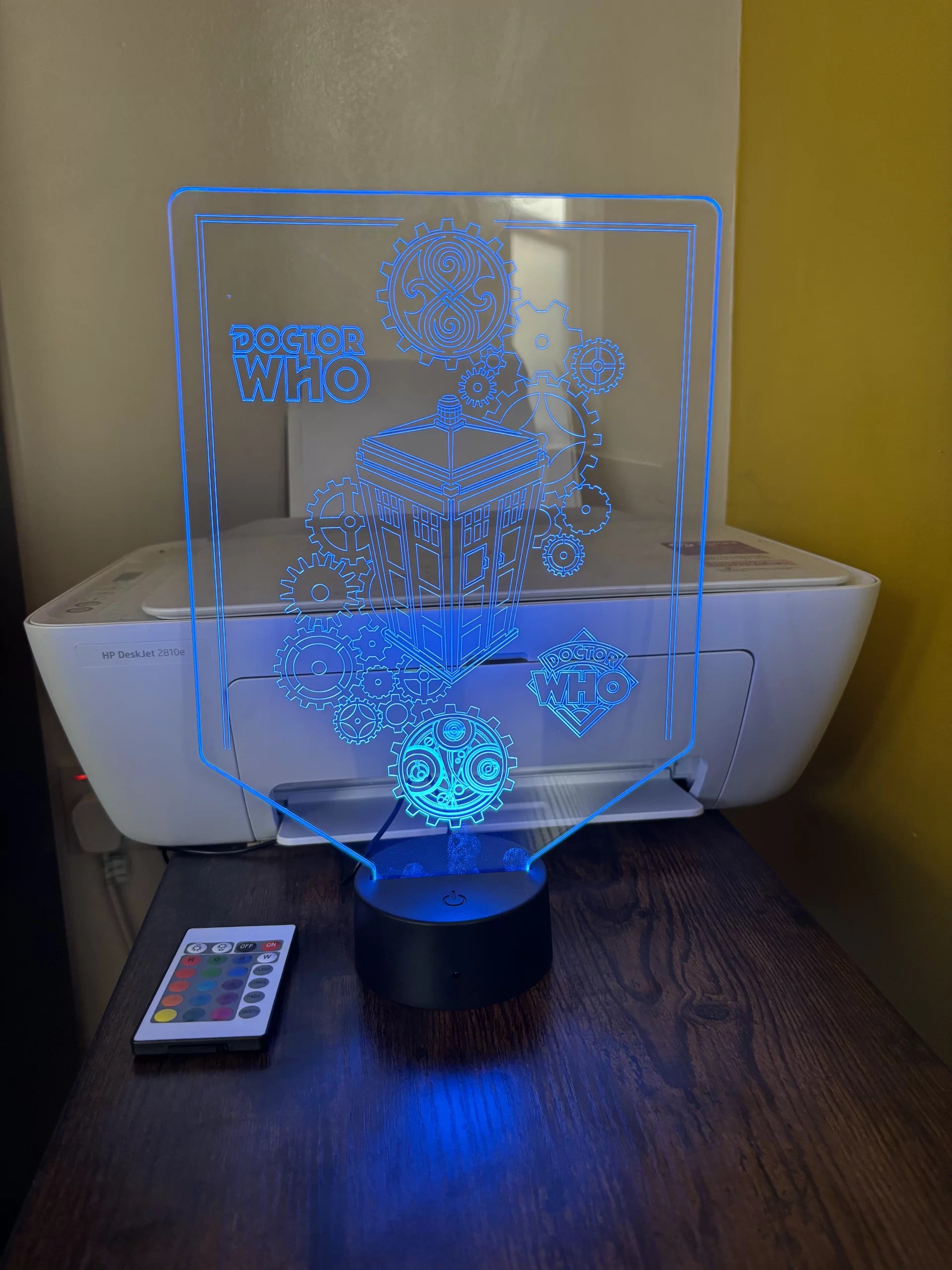 A Doctor Who sign lit up in Blue