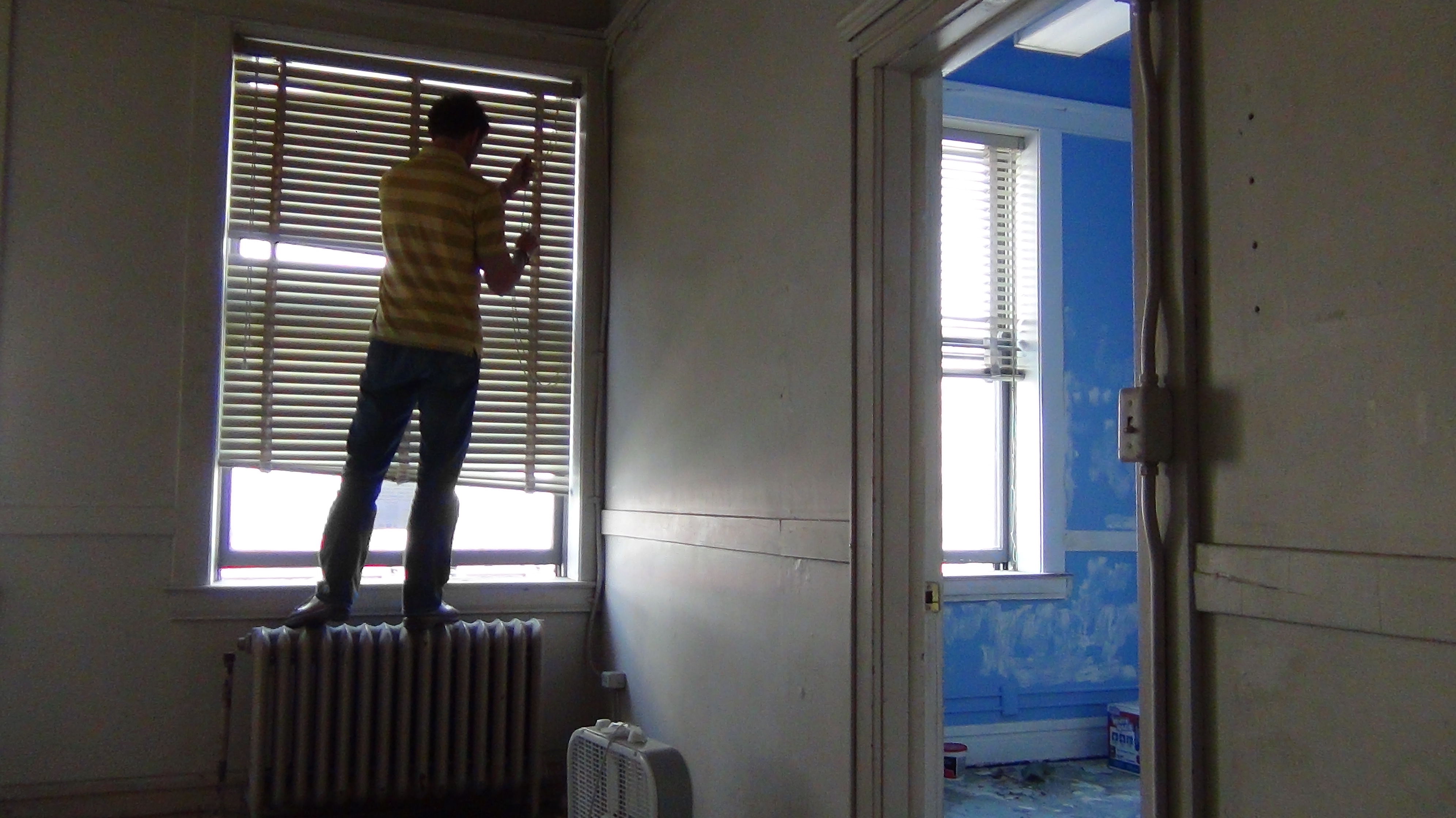 General Manager Drew Elegante, whose energy and enthusiasm has played a huge role in the theater's return, in the upstairs offices he hopes to turn into artist's studios, overlooking South Michigan Street.