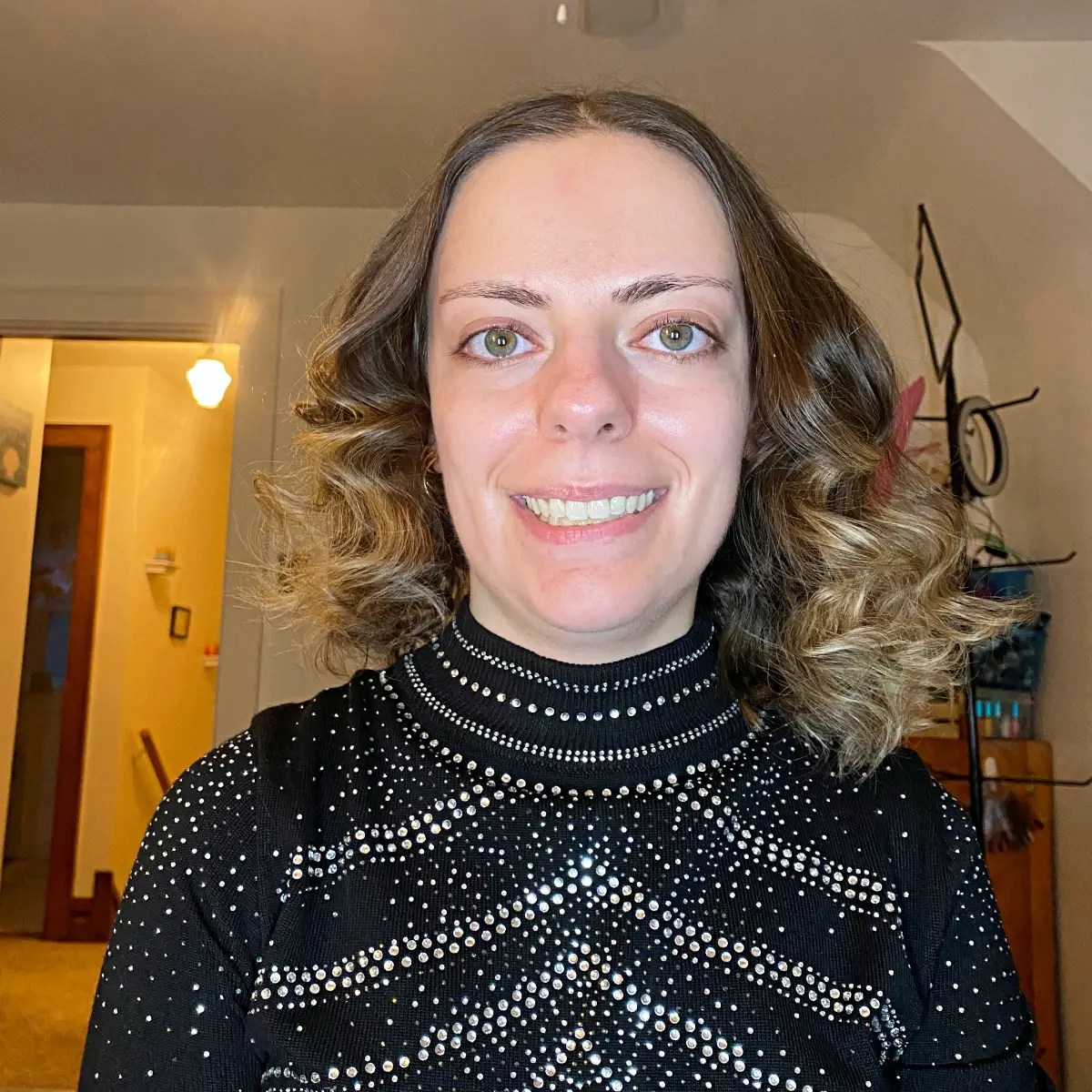 Finger-comb or use a wide-toothed comb for softer curls