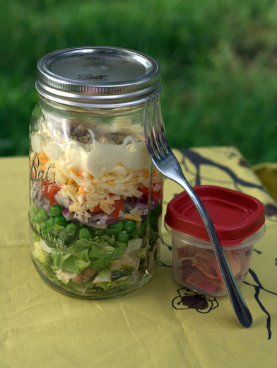 seven layer salad in a mason jar