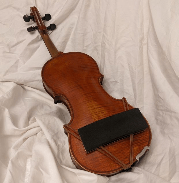 ArcRest Atar mounted on a full size violin"
