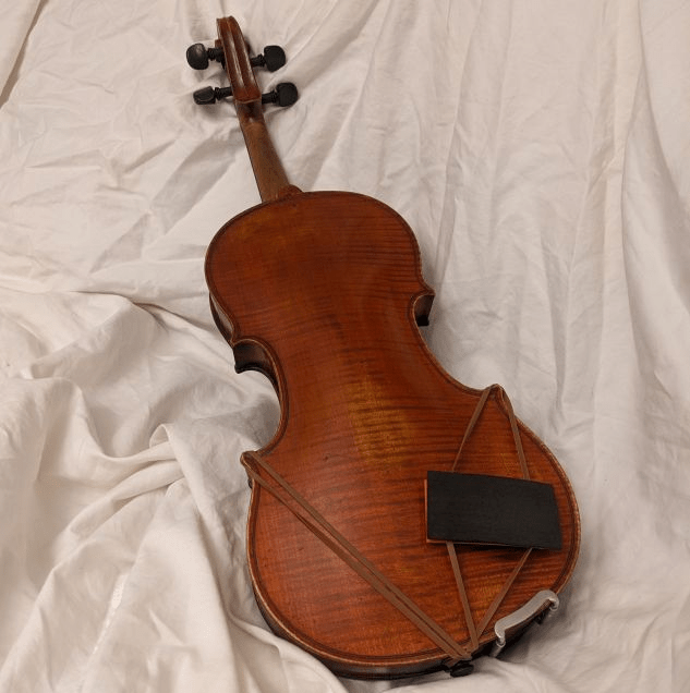 Shoulder Buddy side-mounted on full size violin"