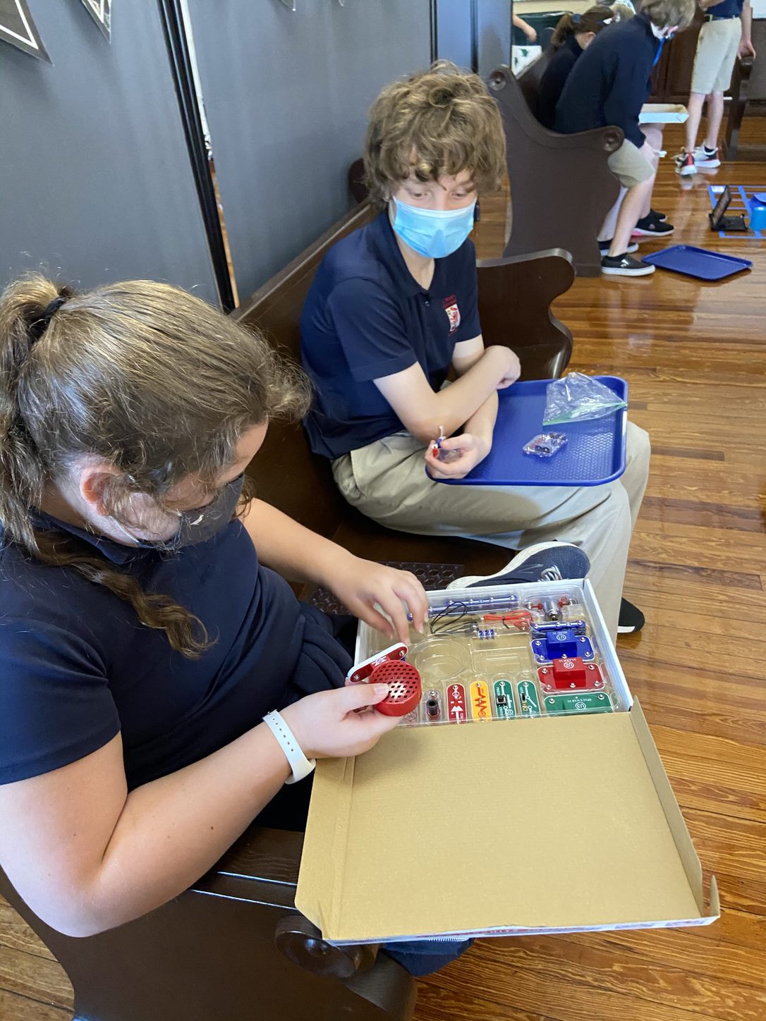 students working with robotics