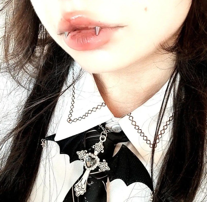 Fang Piercing