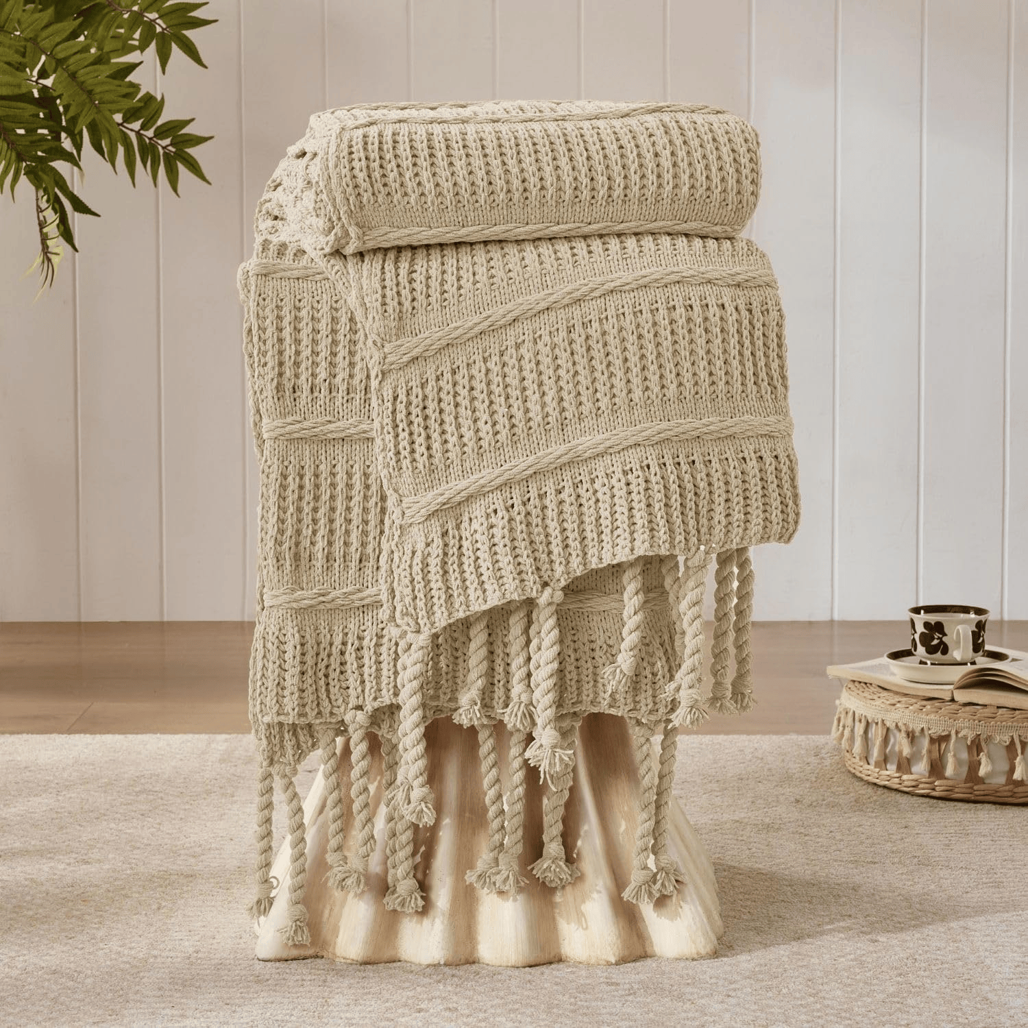 Camel throw blanket adding warm texture to cozy boho Fall decor