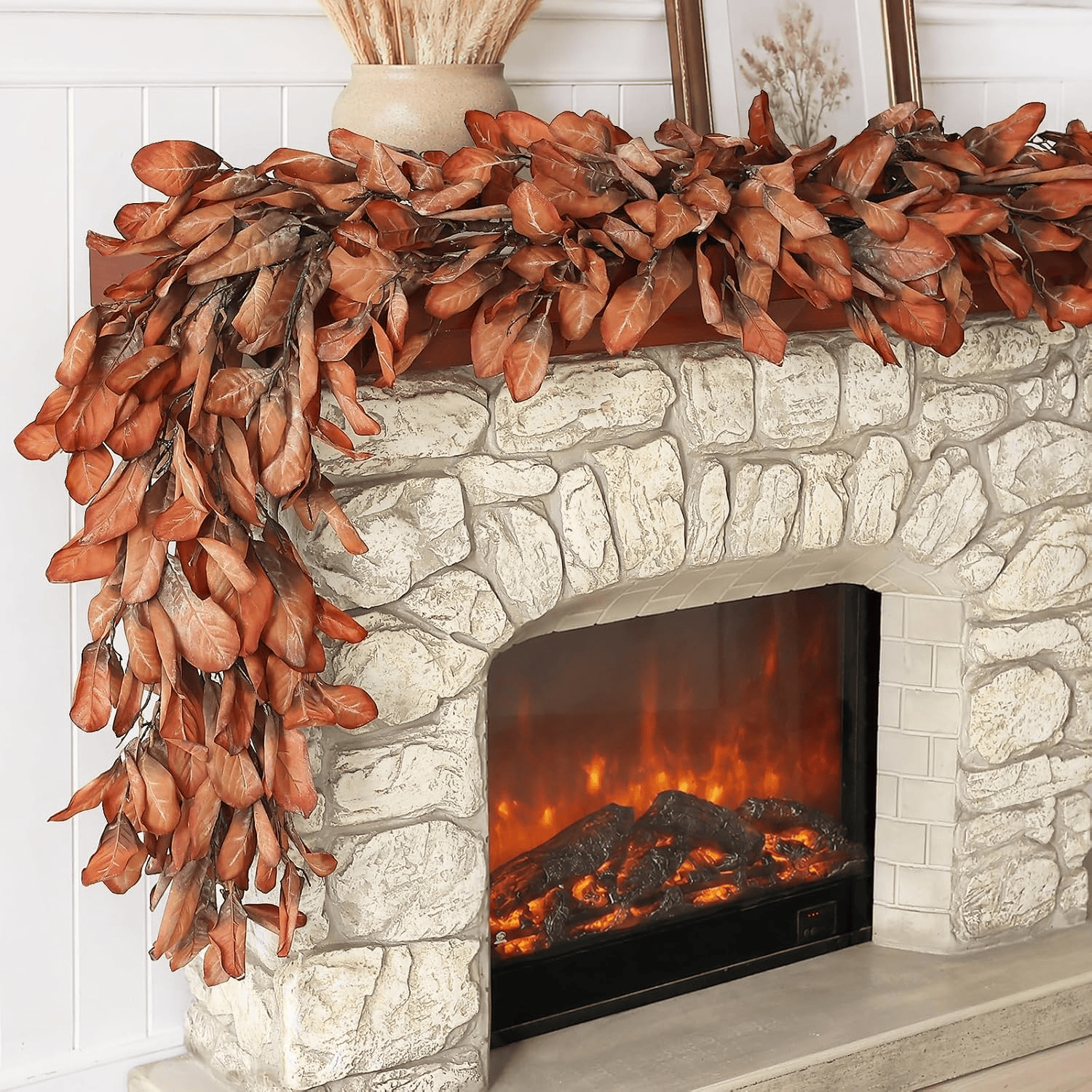 Rust eucalyptus garland styled on a fireplace mantel for boho Fall decor