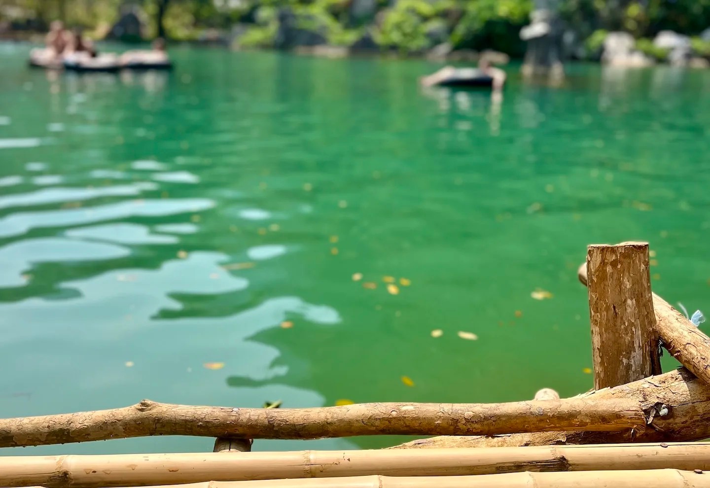 view from a bamboo platform of the turquoise waters of blue lagoon 4