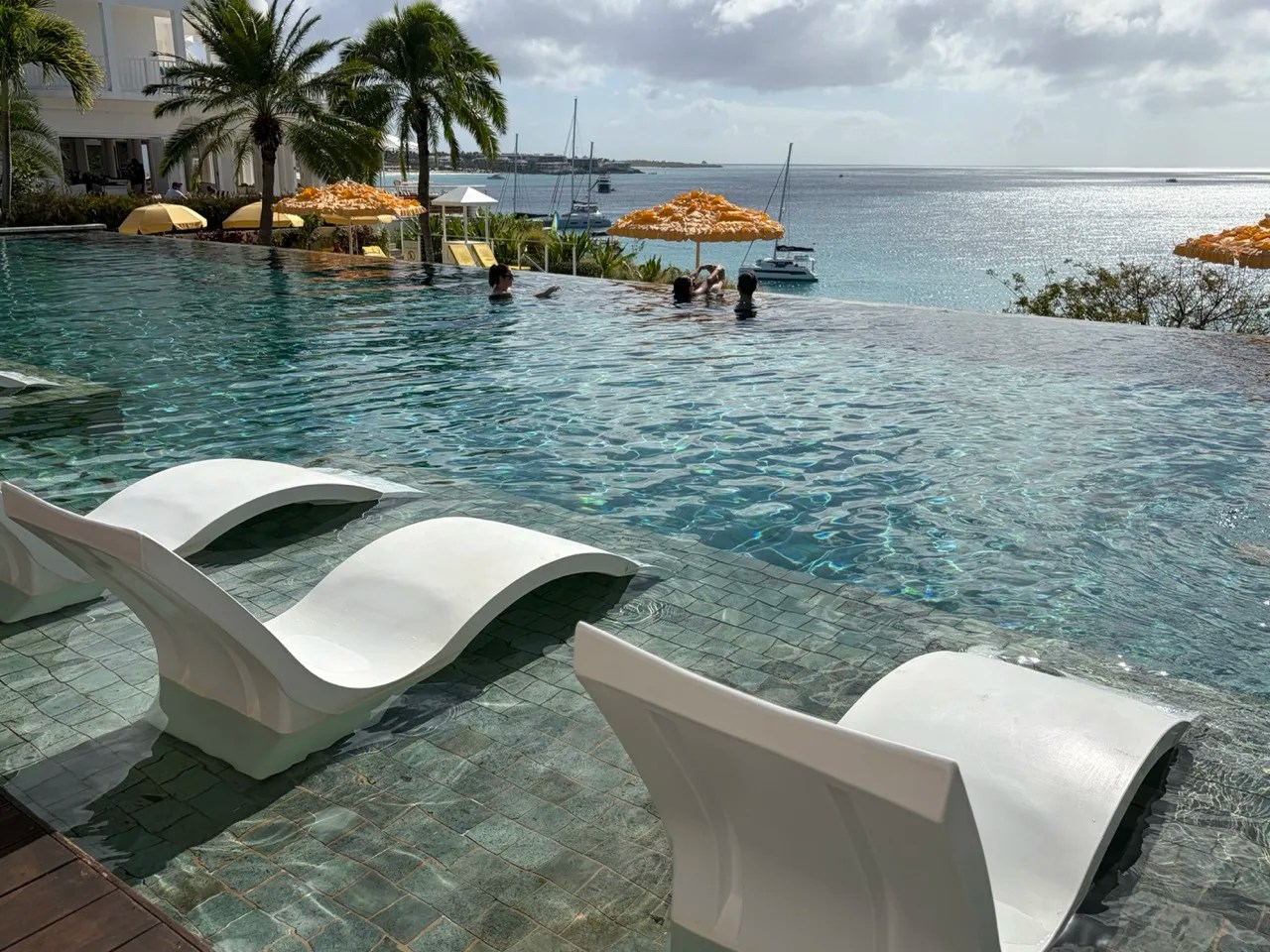 a stunning infinity pool sitting high over the sea at the malliouhana resort in anguilla