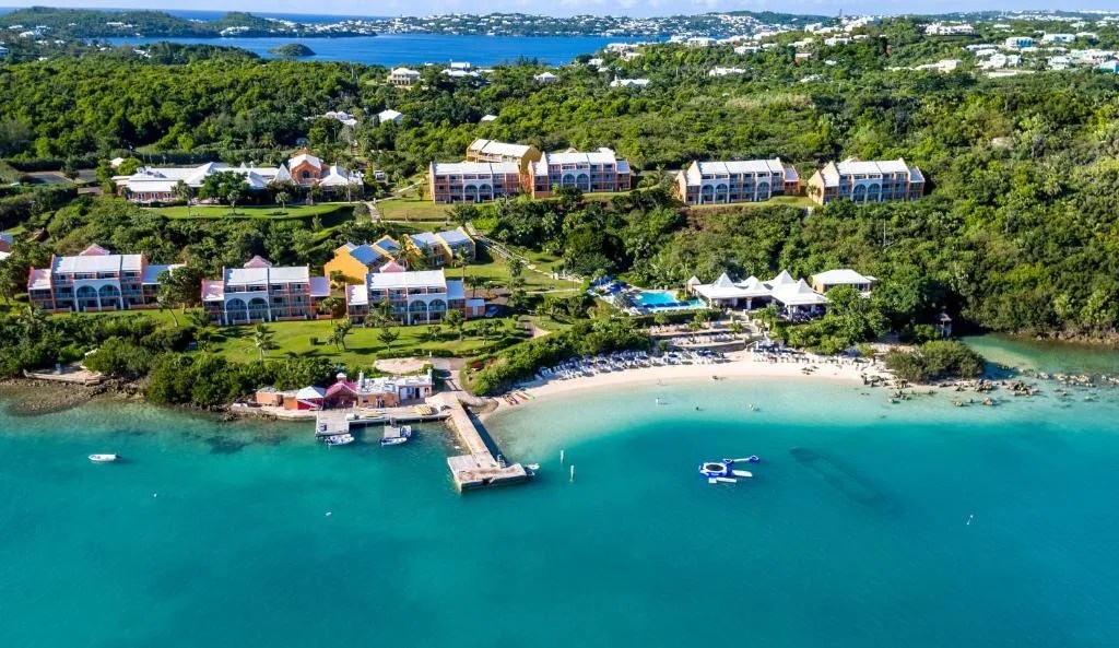 aerial view of grotto bay beach resort with its beach, dock and turquoise bay in hamilton parish, bermuda