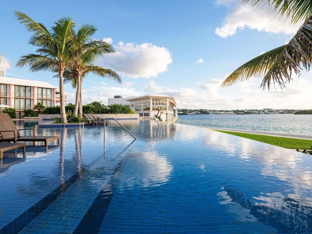 infinity pool next to hamilton harbor at the hamilton princess and beach club, bermuda