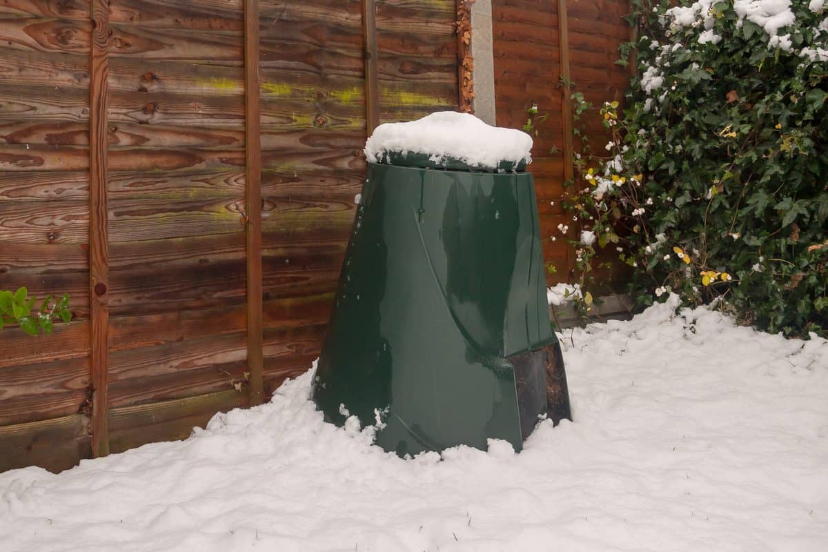 Snow on top of compost bin in winter. Winter composting tips.