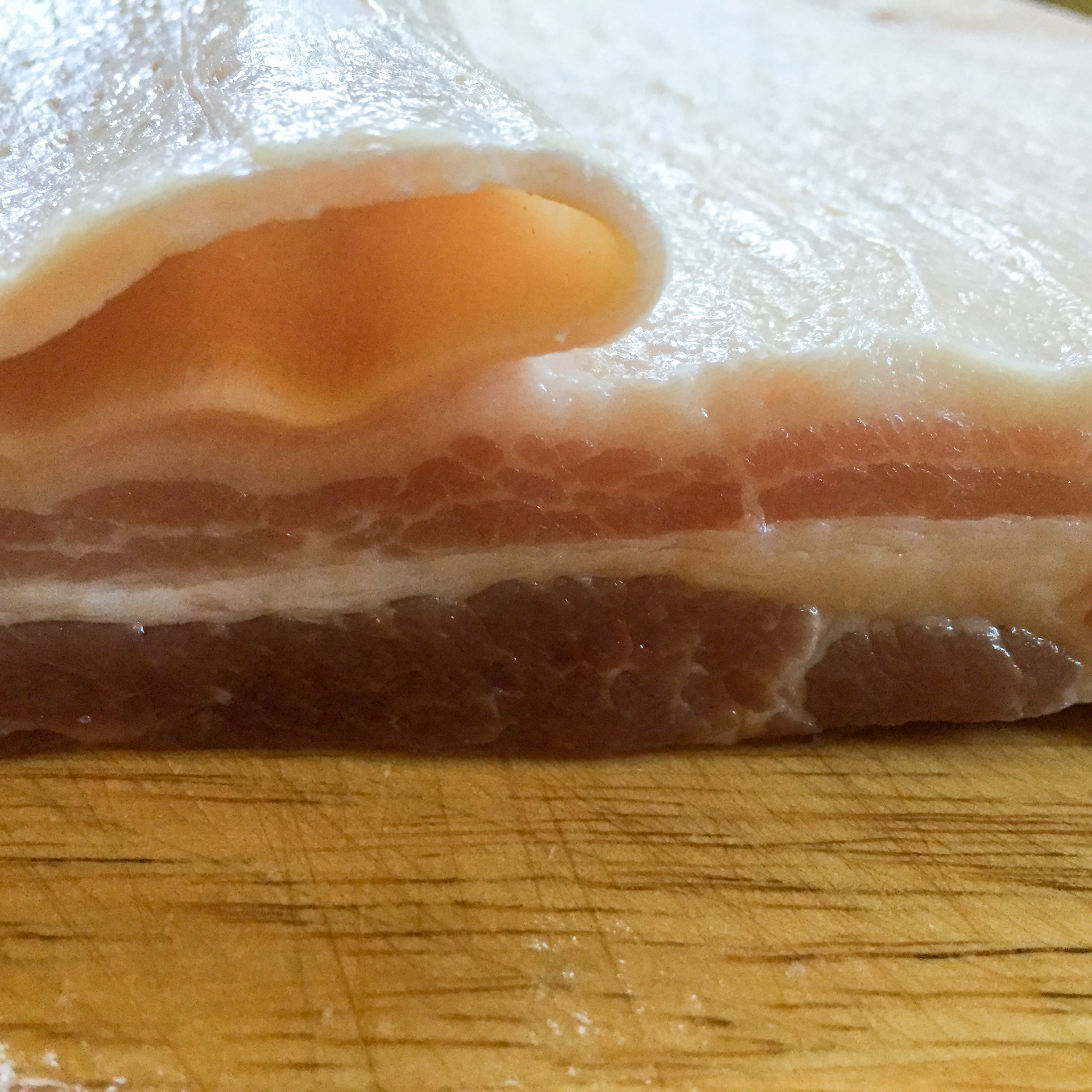 Trim the skin off the fat side, removing as much fat as you can.