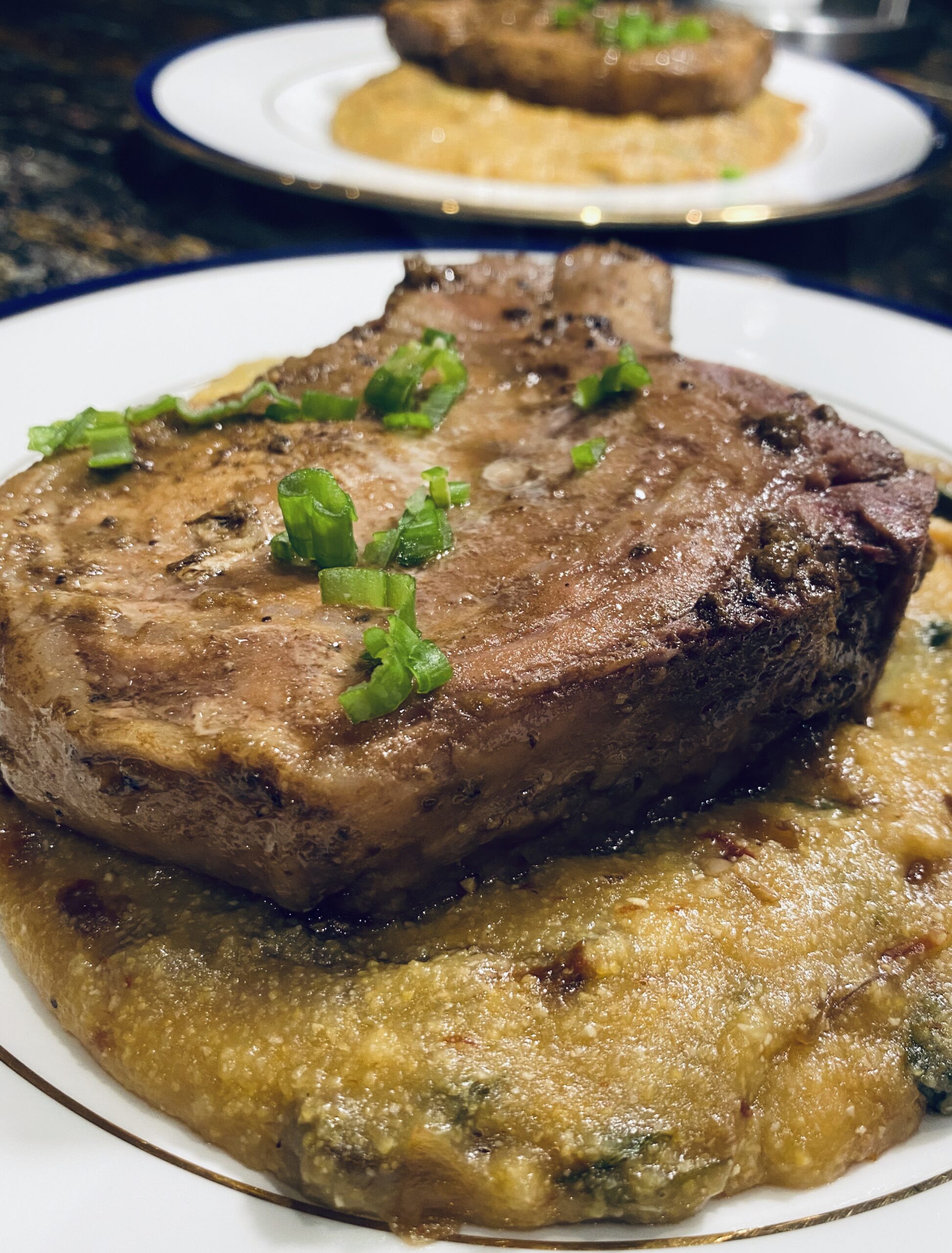 Sous Vide Pork Chops with Sun Dried Tomato Polenta
