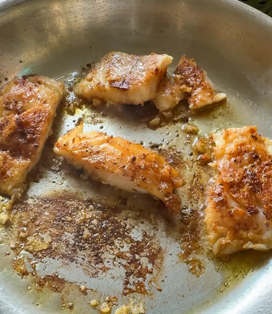 cooked fish in pan