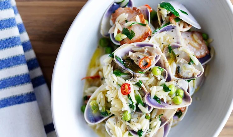 Pippies With Bacon Rissoni Peas & White Wine