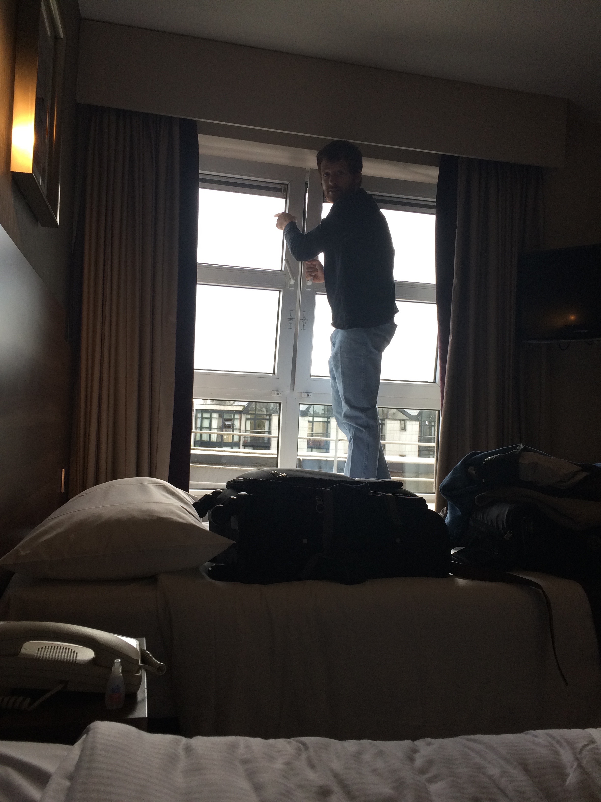 Tim opening the window in our room!