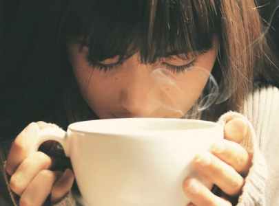 A Girl with Sinusitis inhaling vapours