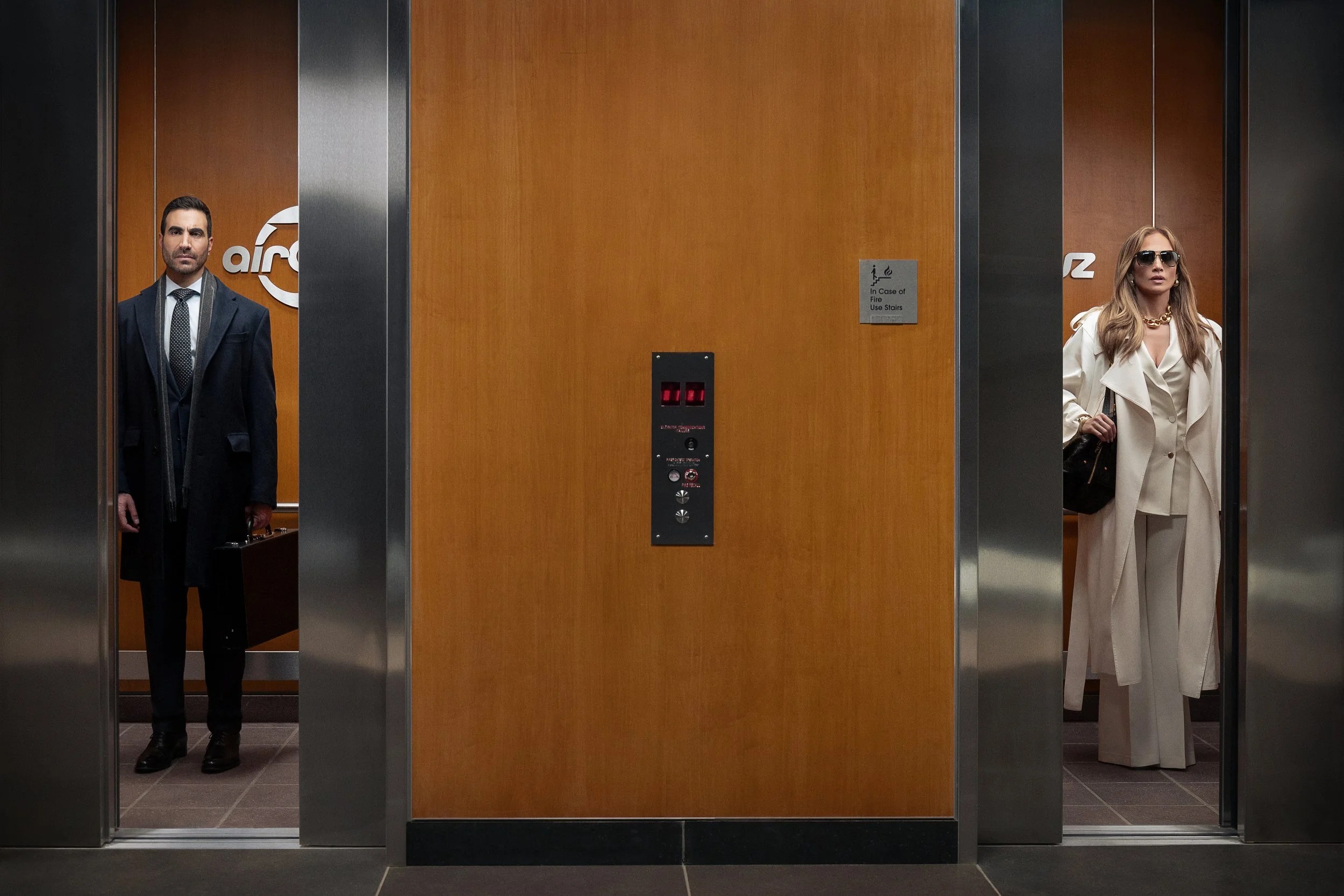 (L-R) Brett Goldstein as Daniel Blanchflower and Jennifer Lopez as Jackie Cruz in Office Romance. Cr. Ana Carballosa/Netflix © 2026.