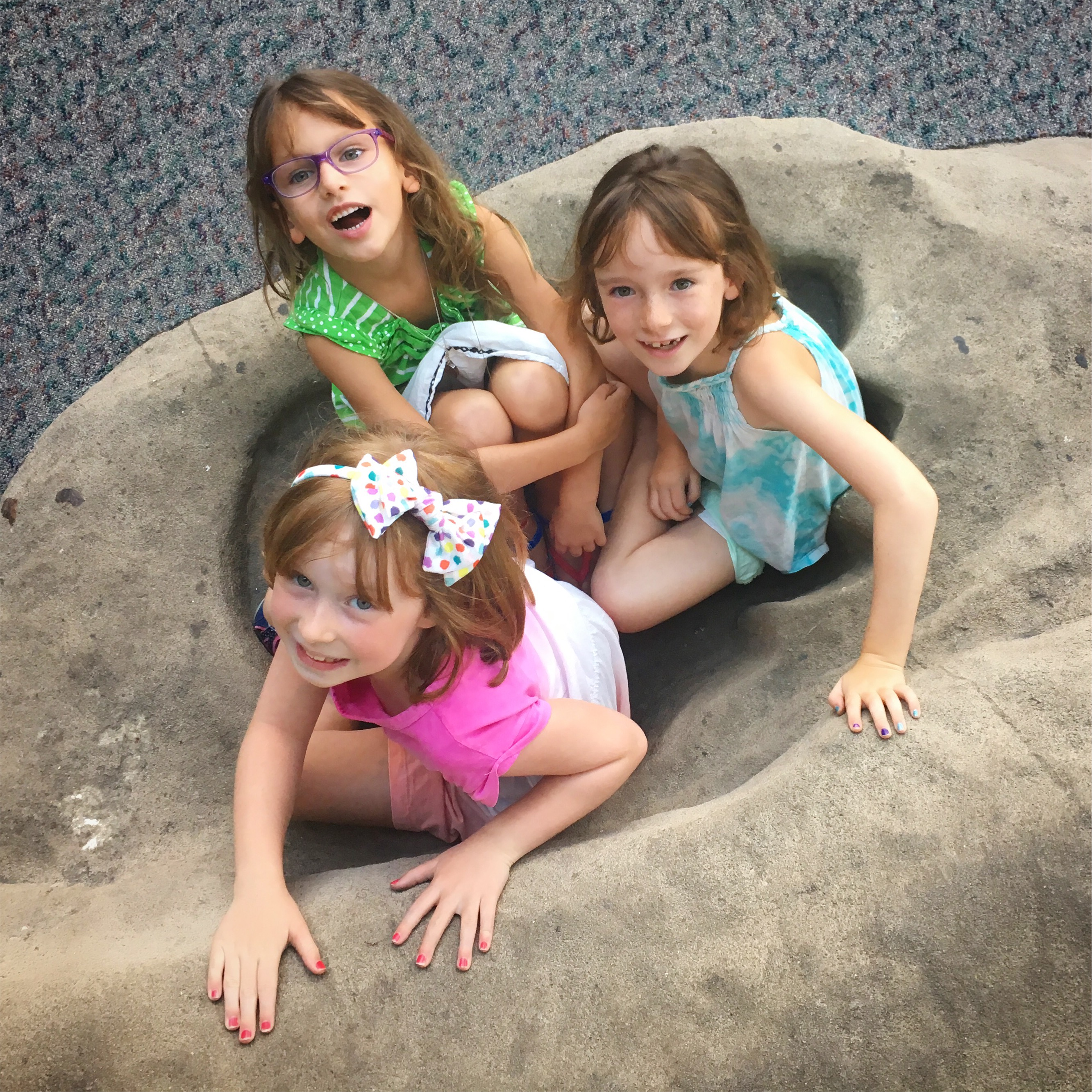 How many little girls fit into a dinosaur footprint?