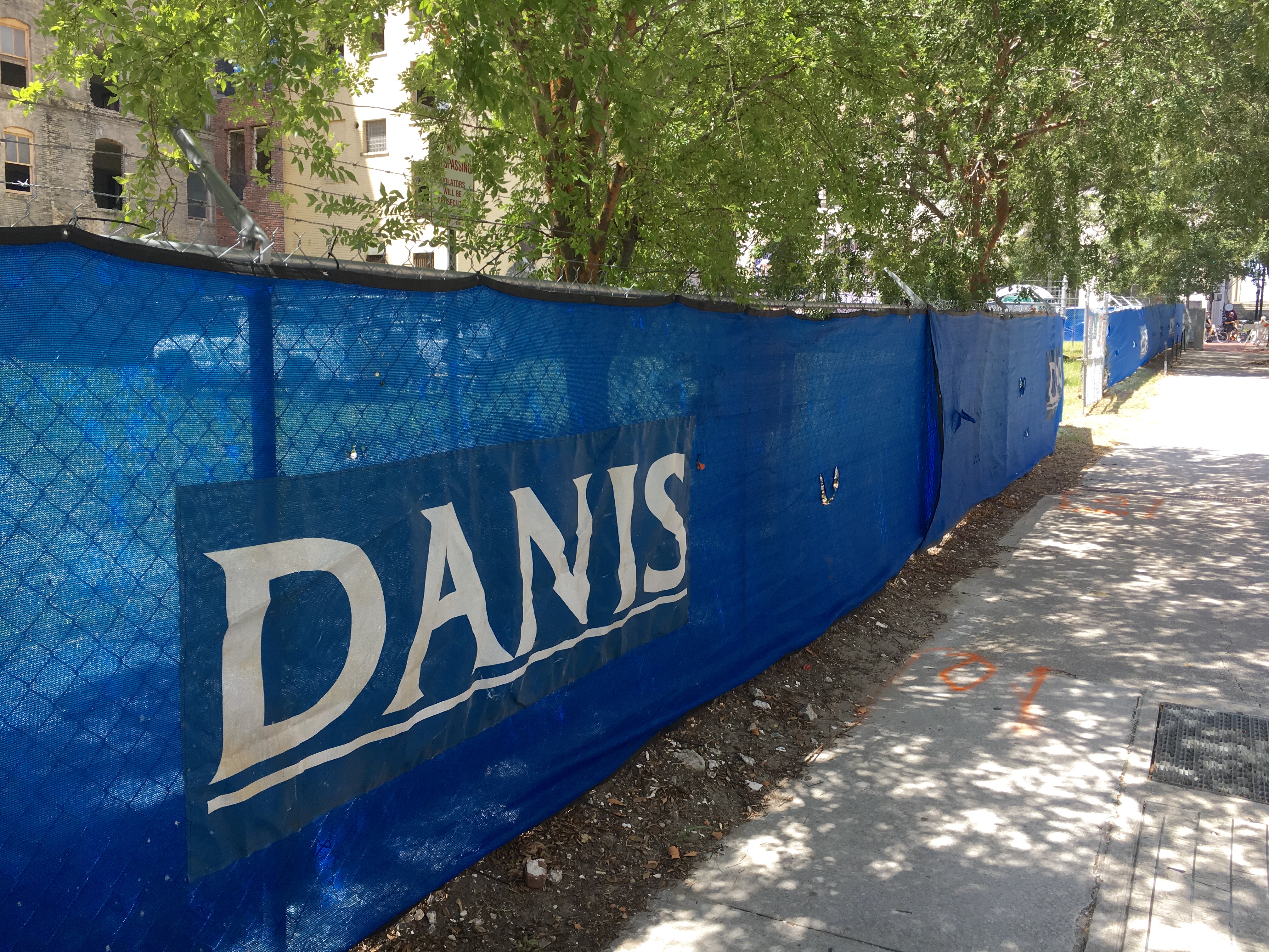 Danis Construction signage outside 20 W Adams St
