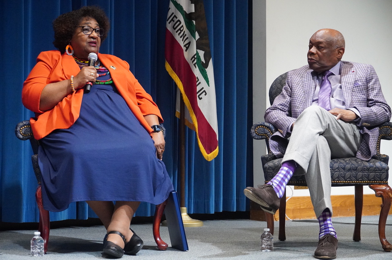 California Secretary of State Shirley Weber, left, and former Assembly Speaker Willie Brown, right, share their experiences and thoughts about the 60th anniversary of the Voting Rights Act of 1965. The commemoration was held at the Secretary of State's auditorium in Sacramento on Aug. 25. CBM photo by Antonio Ray Harvey. 